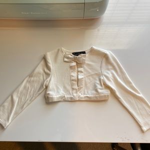 2T NWOT sweater shell.  Ivory with bow closure at top